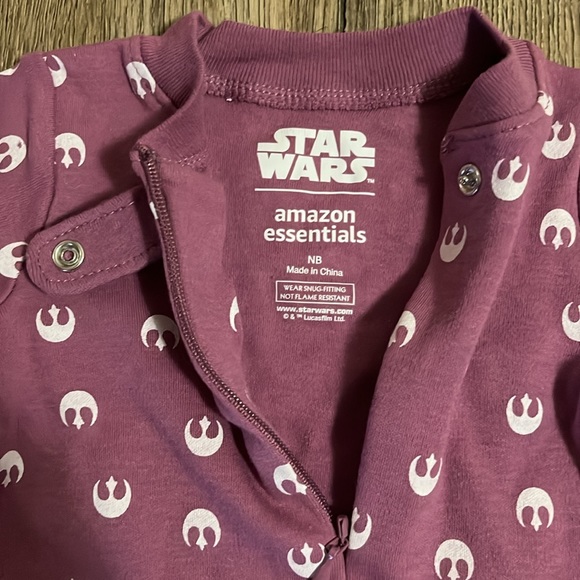 Star Wars resistance footed pajama. Zip up front with over button closure. - Picture 2 of 3